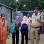 शिवहर के तरियानी में ऑर्केस्ट्रा पर पुलिस की छापेमारी के दौरान दो नाबालिग बच्चियों को मुक्त कराते पुलिस अधिकारी ।